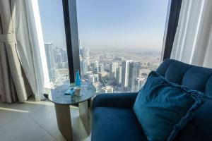 Area soggiorno di Elegant 2BR Apt Address Beach Resort