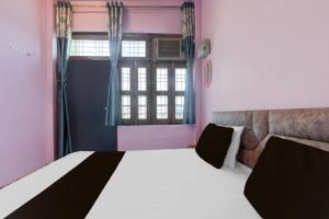 Postel nebo postele na pokoji v ubytování SPOT ON Green Indian Hotel And Rooms + 22 fotografií