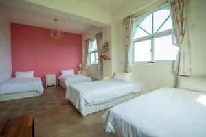 Lova arba lovos apgyvendinimo įstaigoje Ding Shian B&B