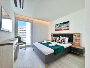 Voodi või voodid majutusasutuse Vilamoura Panoramic 2 With Pool by Homing toas +32 fotot