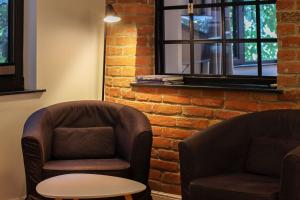 Χώρος καθιστικού στο Charming Little Brick House in Tbilisi - By Wehost +32 φωτογραφίες