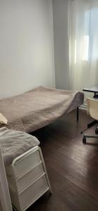Katil atau katil-katil dalam bilik di Private room on upper floor