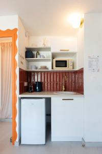 Кухня или мини-кухня в La Casita - Studio Confort avec Terrasse - Emplacement parfait - La Grande Motte, Montpellier
