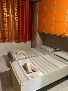 Ένα ή περισσότερα κρεβάτια σε δωμάτιο στο Naxos Domus