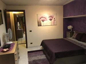 Ένα ή περισσότερα κρεβάτια σε δωμάτιο στο Naxos Domus