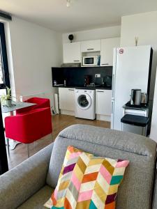 Kuchyňa alebo kuchynka v ubytovaní Appartement standing Vue panoramique sur Nantes