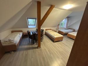 Postel nebo postele na pokoji v ubytování Veno- Niechorze
