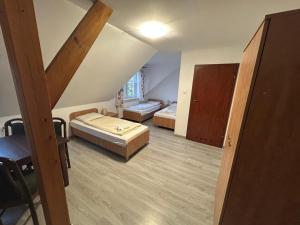 Postel nebo postele na pokoji v ubytování Veno- Niechorze