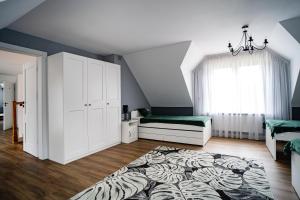 Posteľ alebo postele v izbe v ubytovaní Dom Nasutów