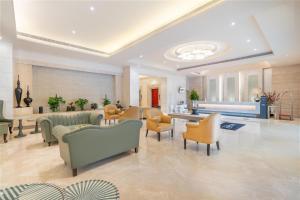 Posezení v ubytování Radisson Hyderabad Hitec City