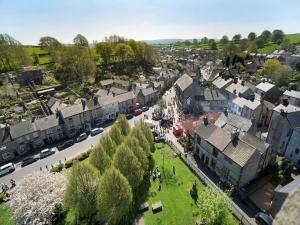 an aerial view of a town with a crowd of people at 2 Bed in Tideswell 81534 in Tideswell