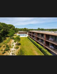 an aerial view of a building with a yard at Studio Pont du Gard in Remoulins