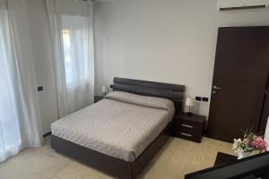 Postel nebo postele na pokoji v ubytování Sirio