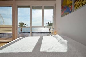 Posteľ alebo postele v izbe v ubytovaní Orilla playa aguadulce