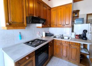 Kuchyň nebo kuchyňský kout v ubytování Apartments by the sea Mali Losinj (Losinj) - 8006