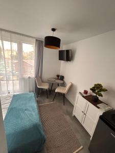 Postel nebo postele na pokoji v ubytování Pokoje I Apartamenty Polna 19