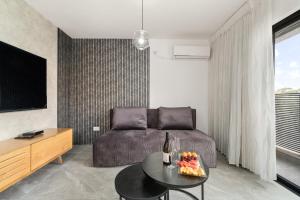 Posezení v ubytování Gesher Haziv Peaceful Modern Stay by Sea N' Rent