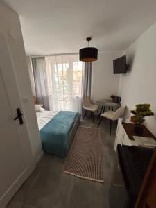 Postel nebo postele na pokoji v ubytování Pokoje I Apartamenty Polna 19