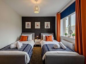 Ένα ή περισσότερα κρεβάτια σε δωμάτιο στο 2 Bed in Lulworth Cove 91197