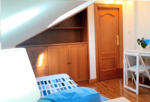 Postel nebo postele na pokoji v ubytování alaia apartamento