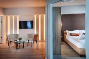 Postel nebo postele na pokoji v ubytování Tuscany Inn