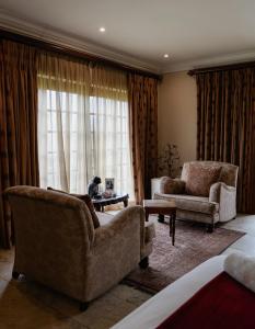 Khu vực ghế ngồi tại Afrique Boutique Ruimsig