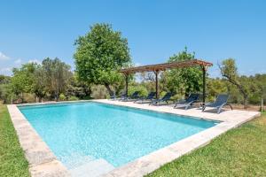 The swimming pool at or close to Rustica En Porto Colom-es Sequer