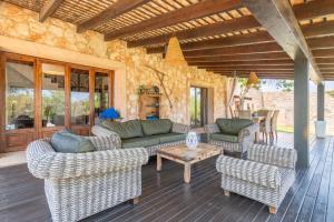 A seating area at Rustica En Porto Colom-es Sequer