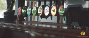 a bunch of pins are lined up on a bench at Grand Central Hotel in Ó Méith