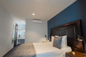Letto o letti in una camera di Best Western Real Tula Express
