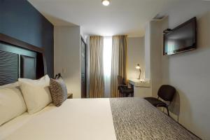 Postel nebo postele na pokoji v ubytování Best Western Real Tula Express + 37 fotografií