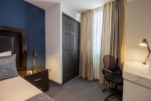 Letto o letti in una camera di Best Western Real Tula Express