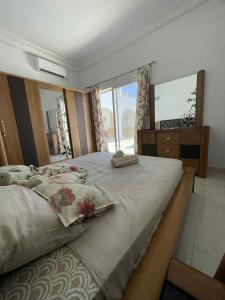 Postel nebo postele na pokoji v ubytování Noussa