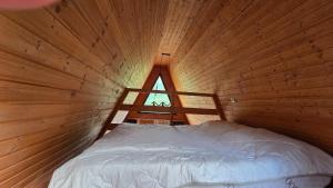 Voodi või voodid majutusasutuse Cottage Tvishi toas