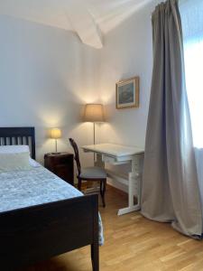 Postel nebo postele na pokoji v ubytování Attico a pochi passi dal Campo