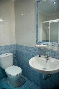 Koupelna v ubytování Hotel Escudero