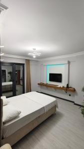 Postel nebo postele na pokoji v ubytování KILIÇ MOTEL