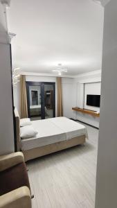 Postel nebo postele na pokoji v ubytování KILIÇ MOTEL