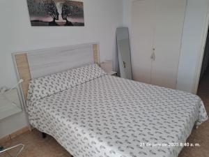 Posteľ alebo postele v izbe v ubytovaní Piso Gavina Palamos