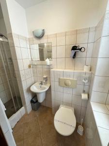 Koupelna v ubytování Hotel Vladimír + 37 fotografií
