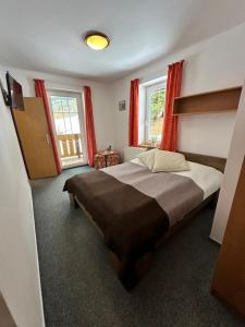 Postel nebo postele na pokoji v ubytování Hotel Vladimír