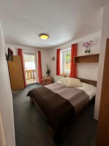 Postel nebo postele na pokoji v ubytování Hotel Vladimír