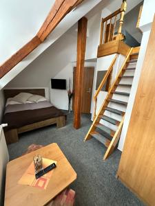 Postel nebo postele na pokoji v ubytování Hotel Vladimír