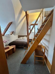 Postel nebo postele na pokoji v ubytování Hotel Vladimír