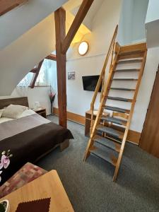 Postel nebo postele na pokoji v ubytování Hotel Vladimír
