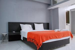 Ένα ή περισσότερα κρεβάτια σε δωμάτιο στο Blue Breeze +39 φωτογραφίες