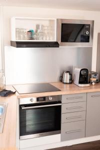 Kuchyňa alebo kuchynka v ubytovaní Hyper Centre Orléans : Magnifique appartement