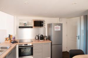 Kuchyňa alebo kuchynka v ubytovaní Hyper Centre Orléans : Magnifique appartement