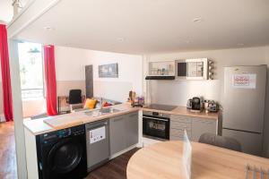 Kuchyňa alebo kuchynka v ubytovaní Hyper Centre Orléans : Magnifique appartement