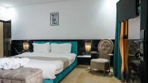 En eller flere senge i et værelse på Villa Palmyra, 8 suites et piscine chauffée + 28 billeder